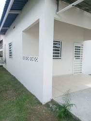 Large swimming pools and water slides aerial view Playa Dorada residential beach community Panama