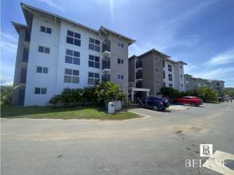 Large resort-style pool and tropical gardens at PH Playa Caracol beachfront complex Punta Chame Panama