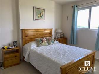 Bright coastal bedroom with ocean views and contemporary furnishings in Punta Chame Panama