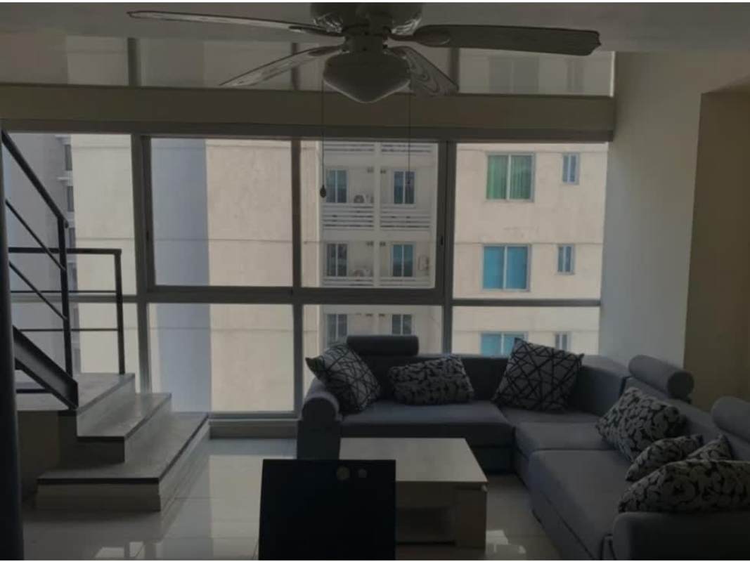 Private cinema room with black leather recliners and large screen at PH Vitro Panama