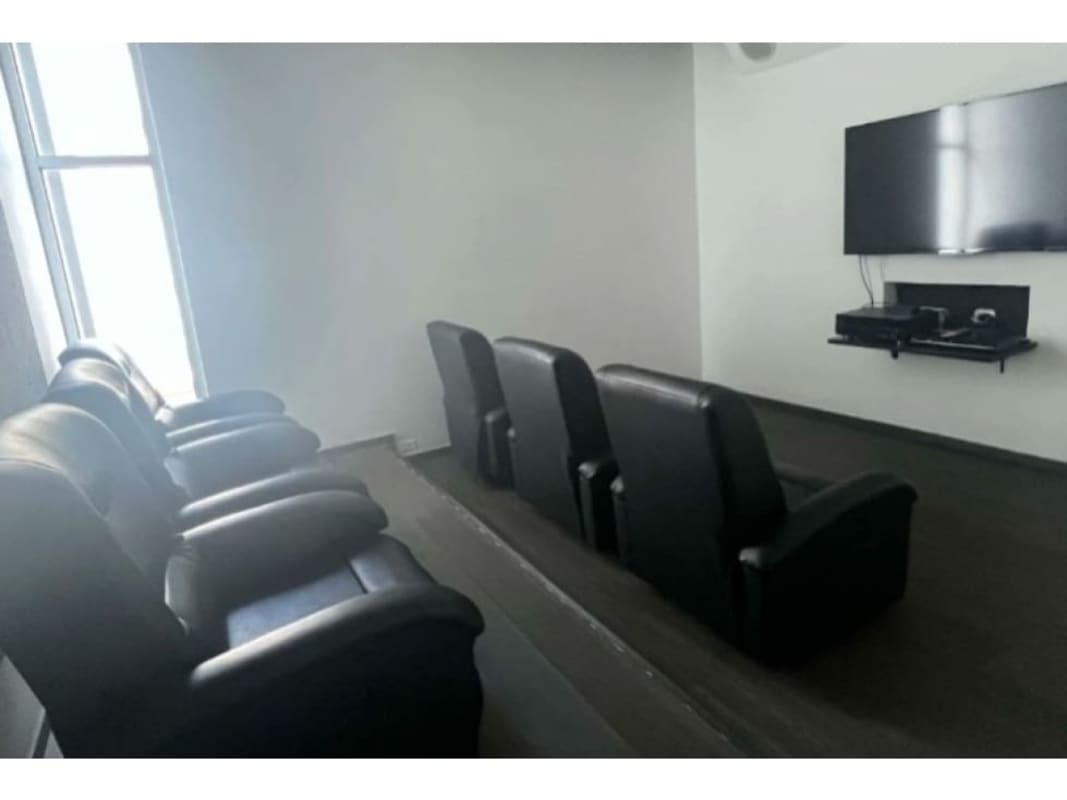 Modern kitchen with granite countertops and dining table at PH Vitro Panama