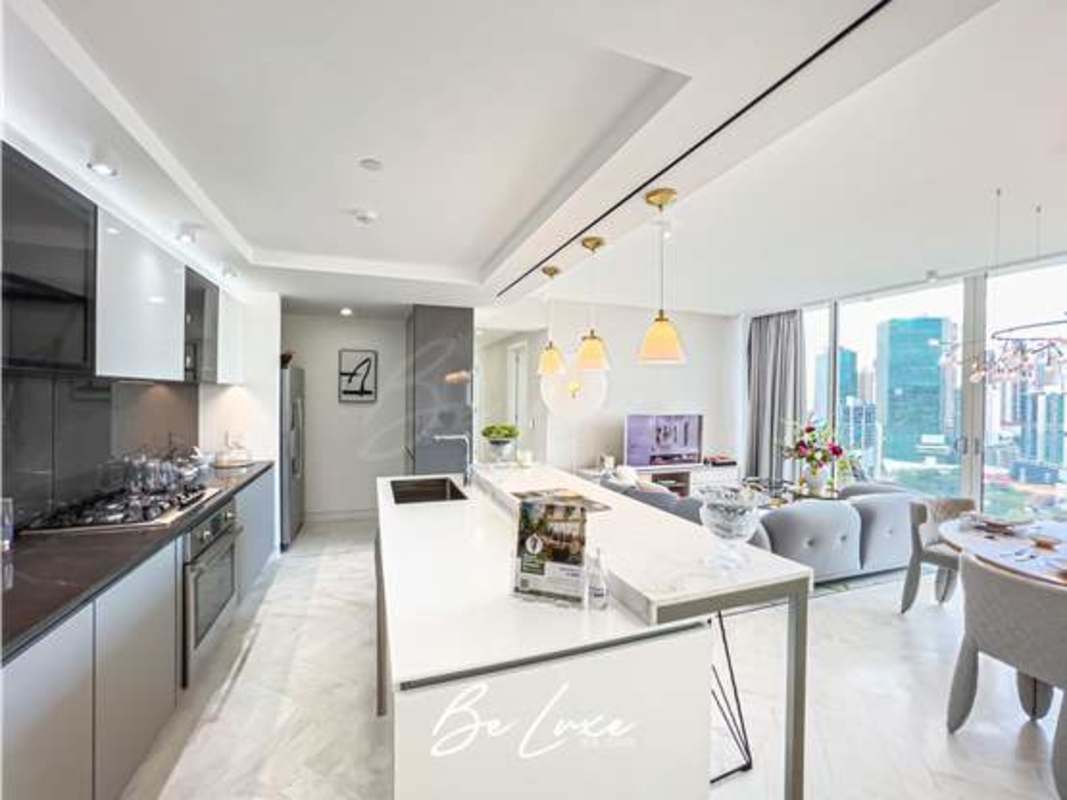 Modern open-plan kitchen and living area with marble flooring and city views in PH Wanders & Yoo Marbella