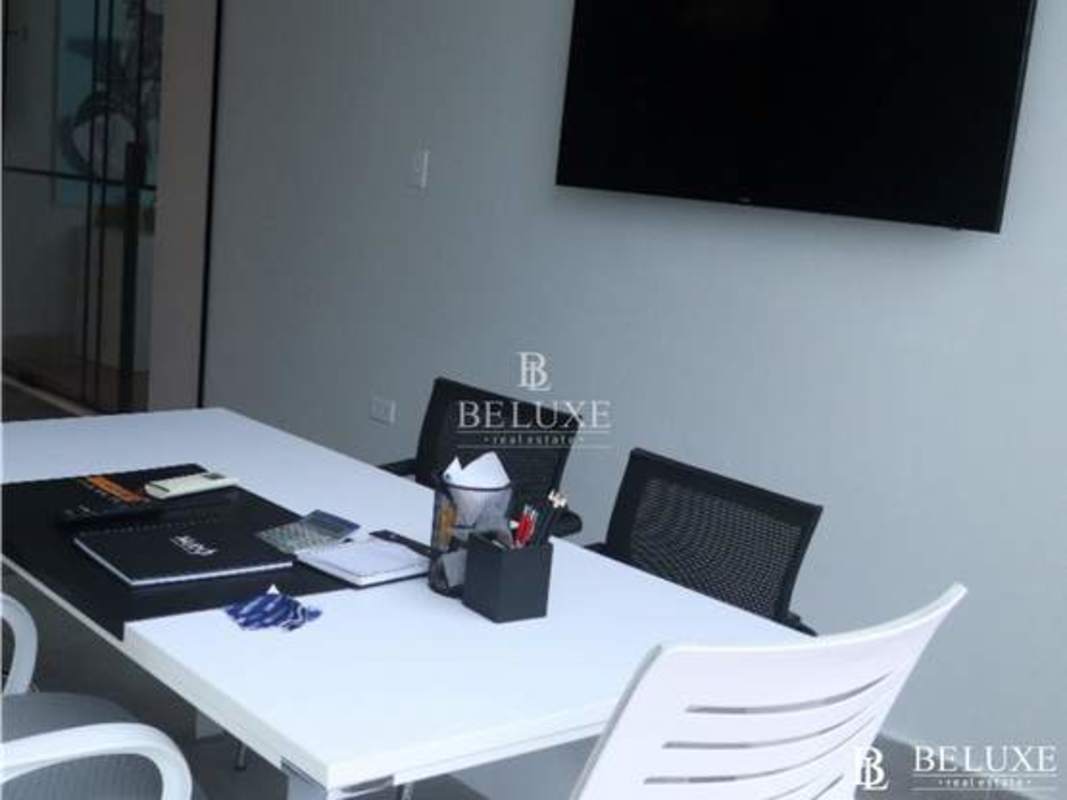 Bright conference room with glass wall partitions in Santa María Business Park Panama City