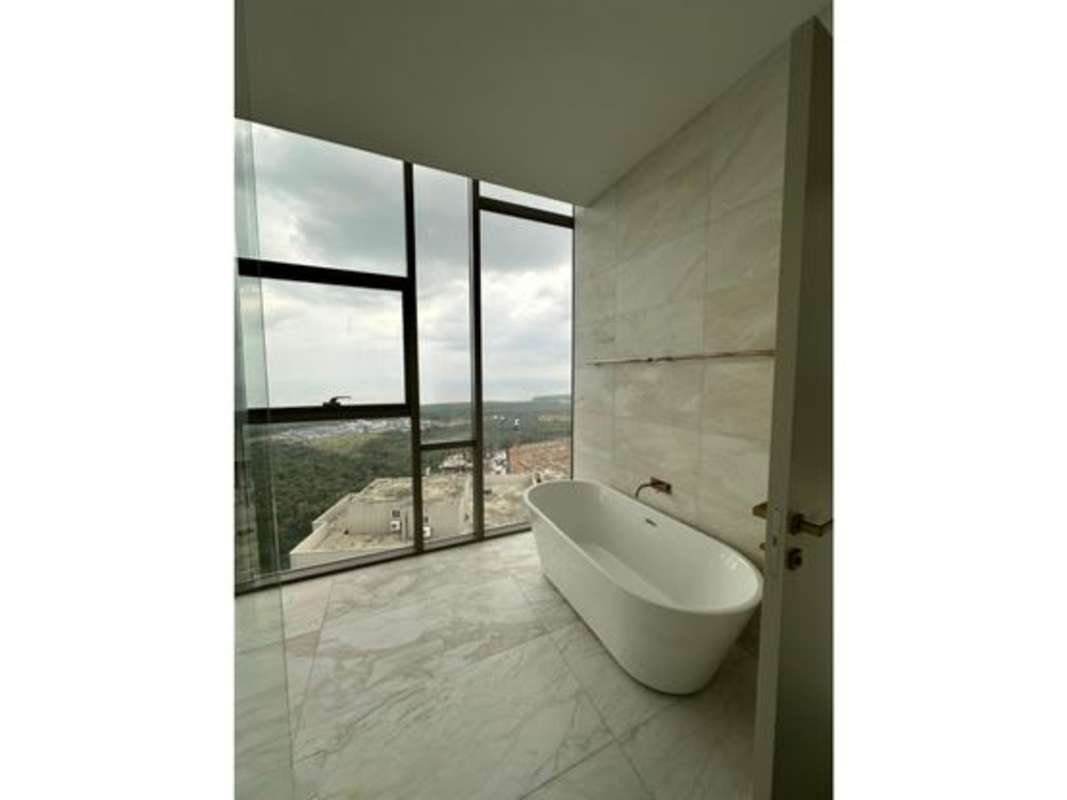 Elegant marble bathroom with panoramic views in PH La Maison by Fendi Santa Maria Panama