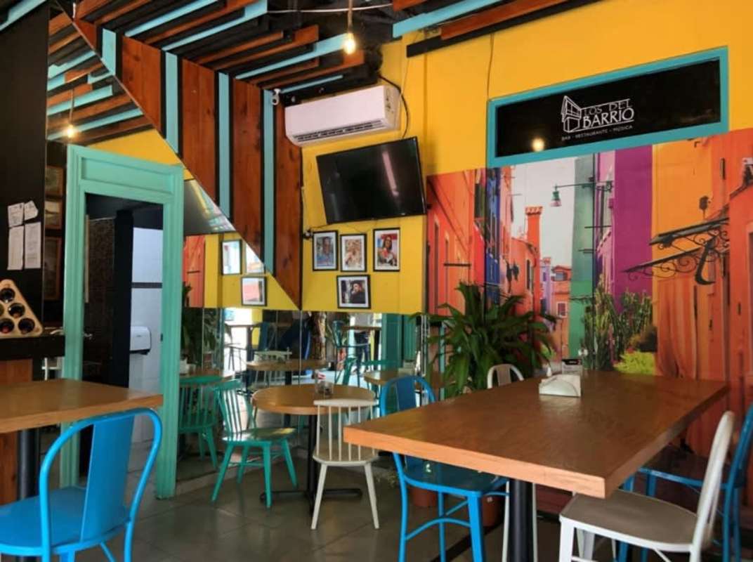 Vibrant cafe restaurant with mural in historic commercial unit Casco Viejo Panama