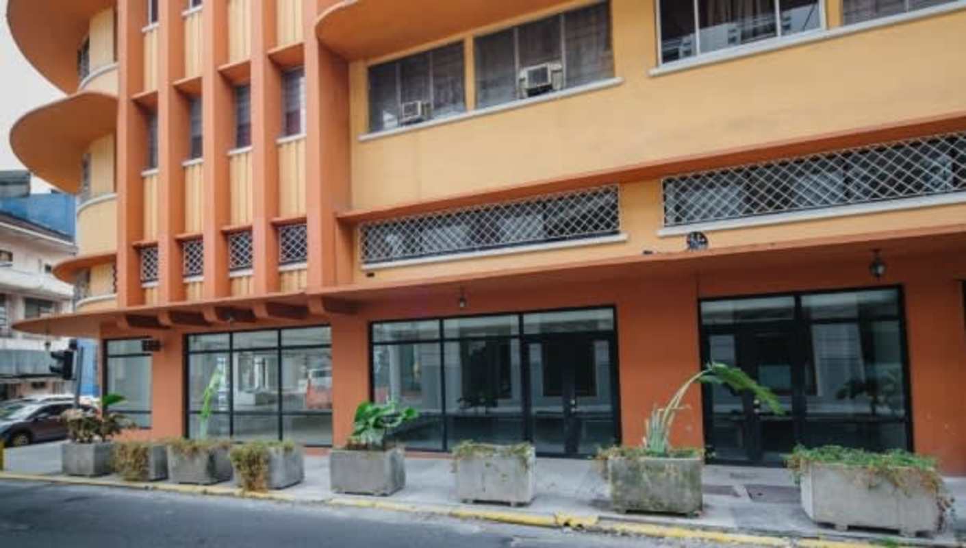 Street-facing commercial space with expansive glass windows in Casco Viejo Panama City's heritage district