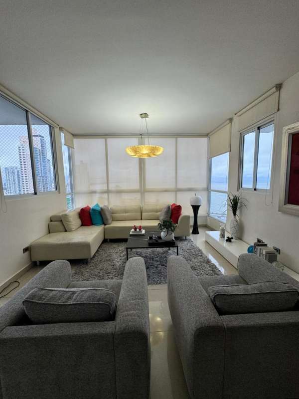 Modern living room with panoramic windows, sectional sofa PH Mandarin Bay Panama City