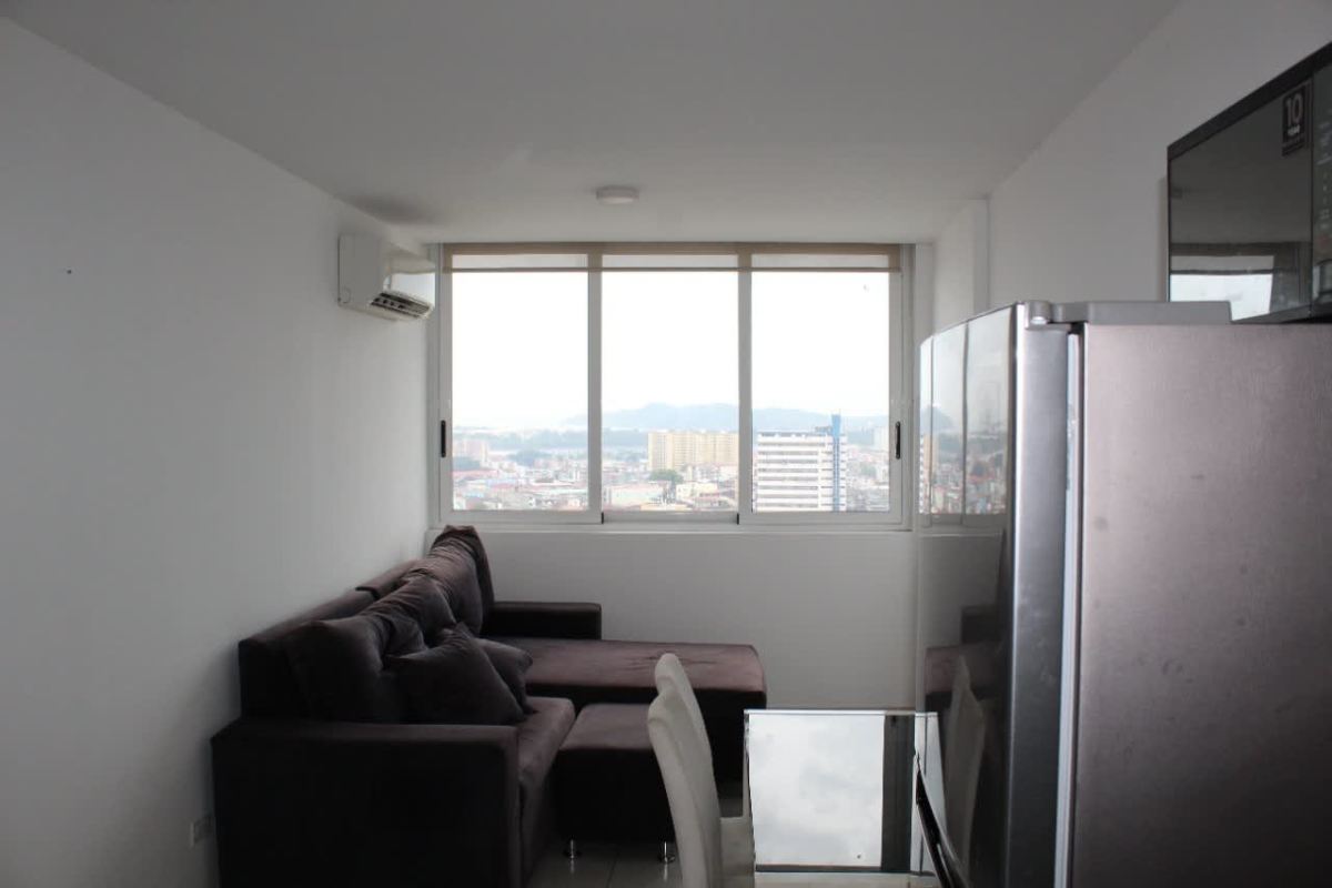 Modern apartment living dining area with large window city view PH Bay View Tower Calidonia Panama
