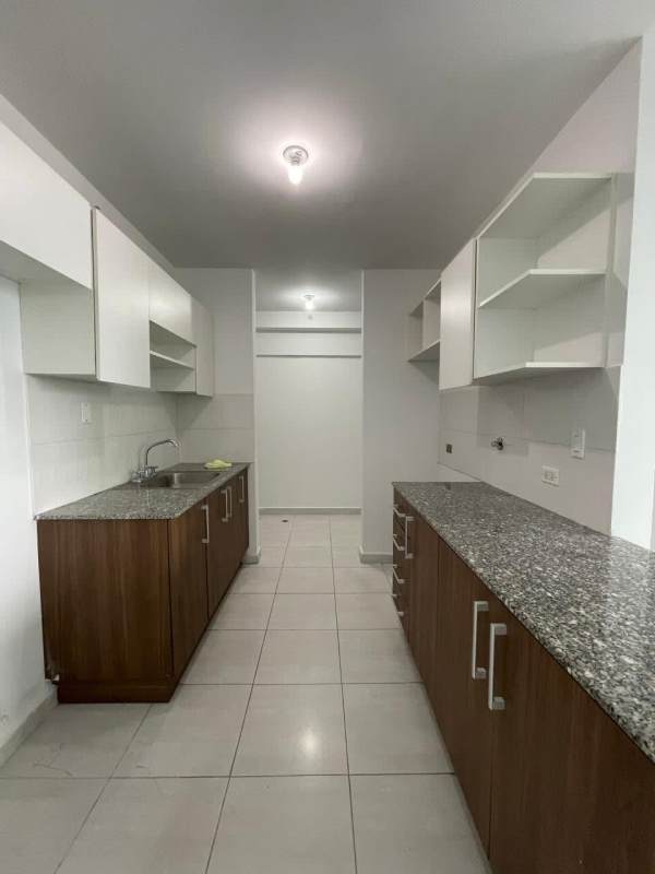 Spacious living dining area with large windows and access to balcony at PH El Carmen Plaza Panama City