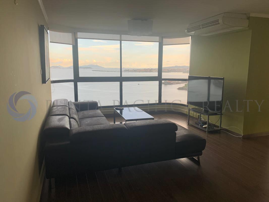 Modern kitchen with stainless appliances and granite countertops in PH Coral Reef Panama City