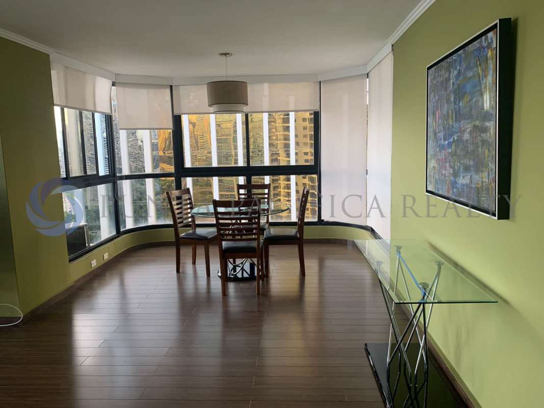 Dining space with curved floor to ceiling glass overlooking ocean PH Coral Reef in Panama