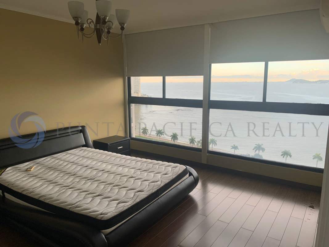 Bright open living dining room with panoramic ocean skyline views PH Coral Reef Panama City