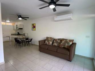 Furnished apartment living dining room with AC ceiling fans tiled floors near beach Gorgona Panama
