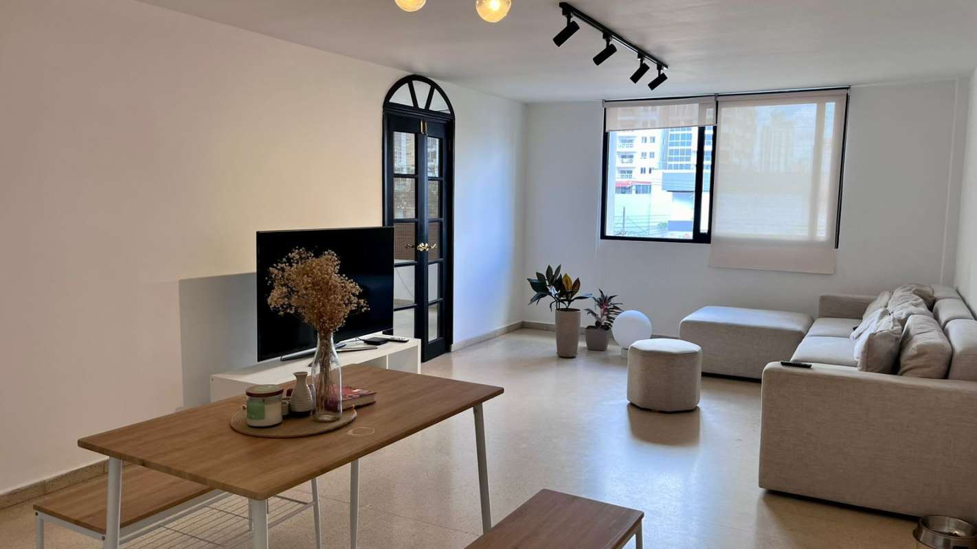Entrance foyer with staircase, neutral decor PH Liz Marie Panama City
