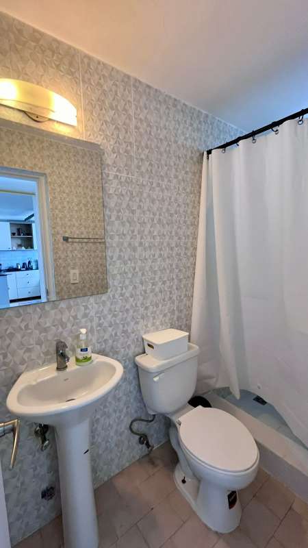 Second bedroom with closet space and window PH Liz Marie in San Francisco Panama