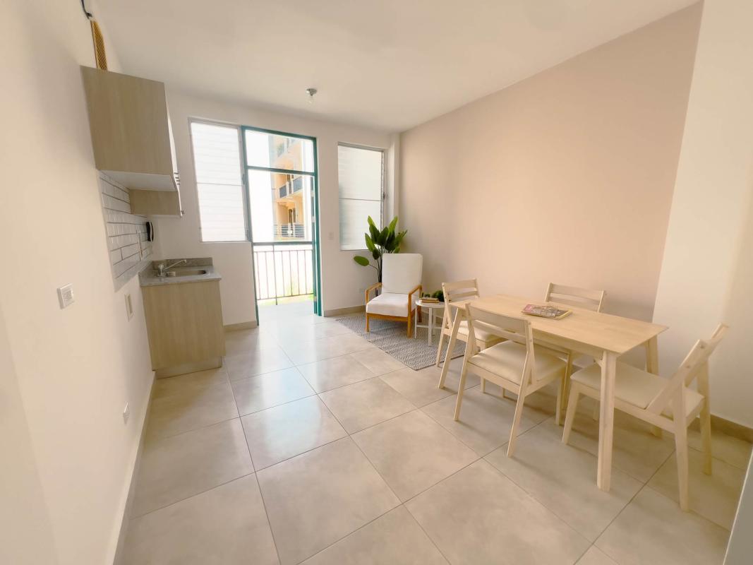 Open gas-ready kitchen with granite countertop in boutique Panama City apartment Casco Viejo