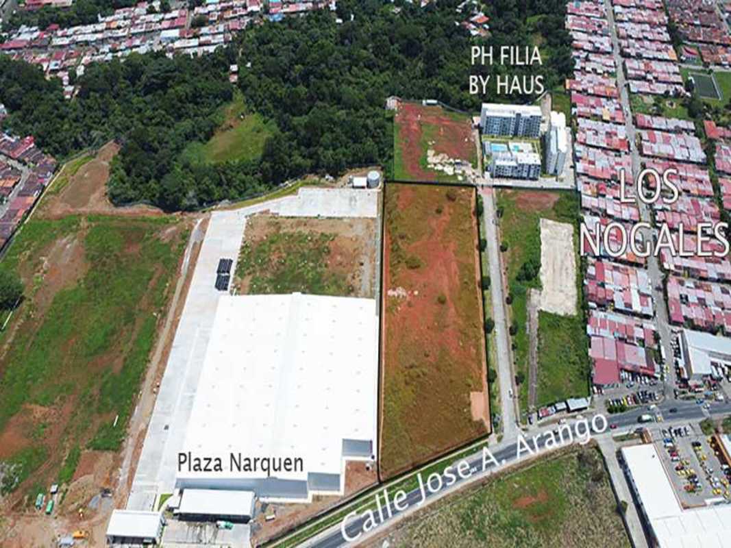 View of adjacent commercial plaza and residential zones around commercial lot for sale in Las Mañanitas Panama