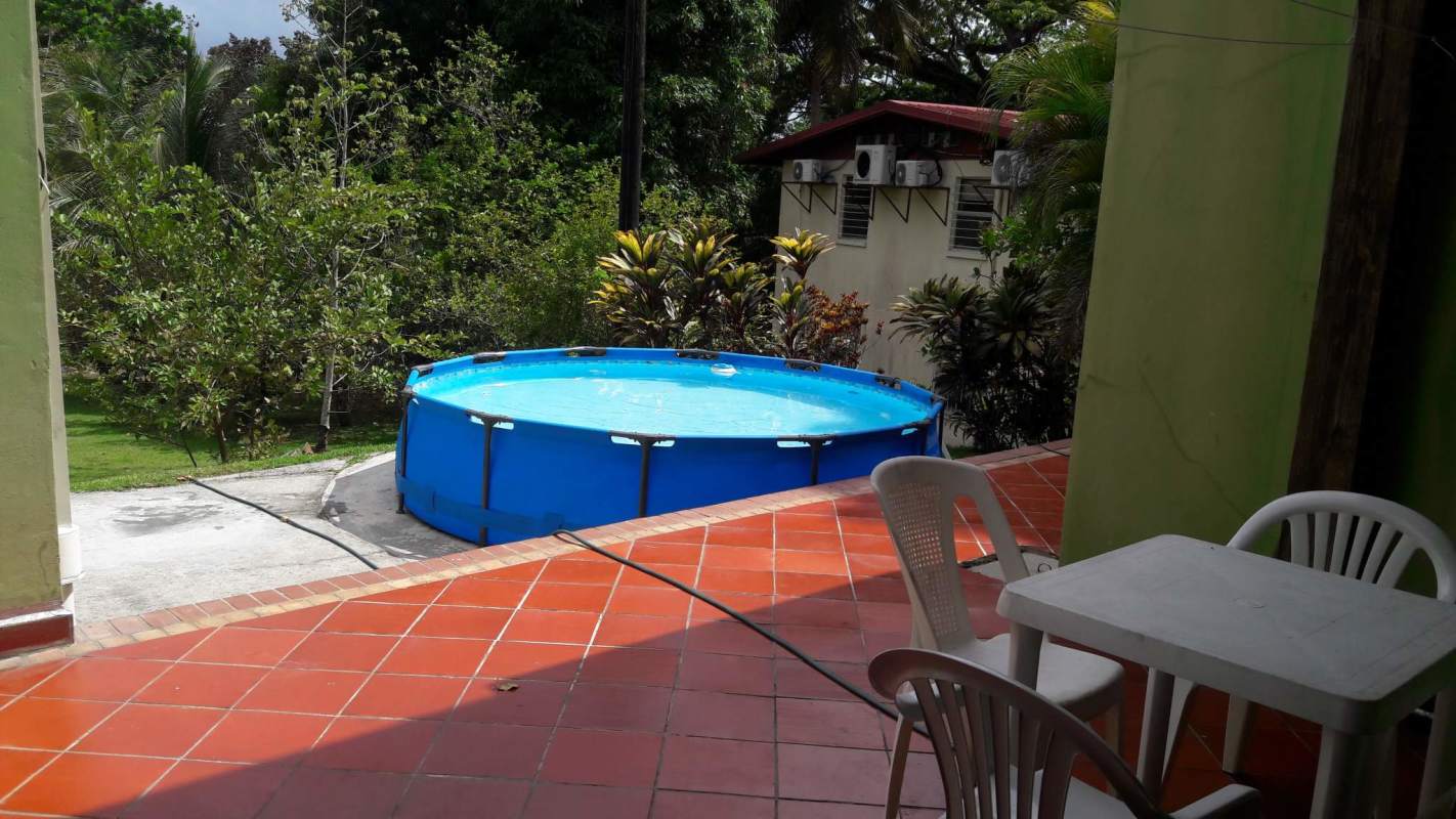 Common area patio with above-ground swimming pool and seating Clayton Panama