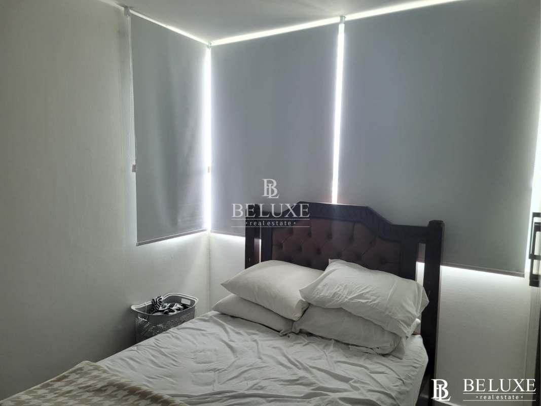 Bright living room with dining area, large windows, modern decor in PH Vivendi Tower Edison Park Panama City