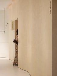 Light beige curved hallway interior Edificio Daviva downtown Santiago Panama