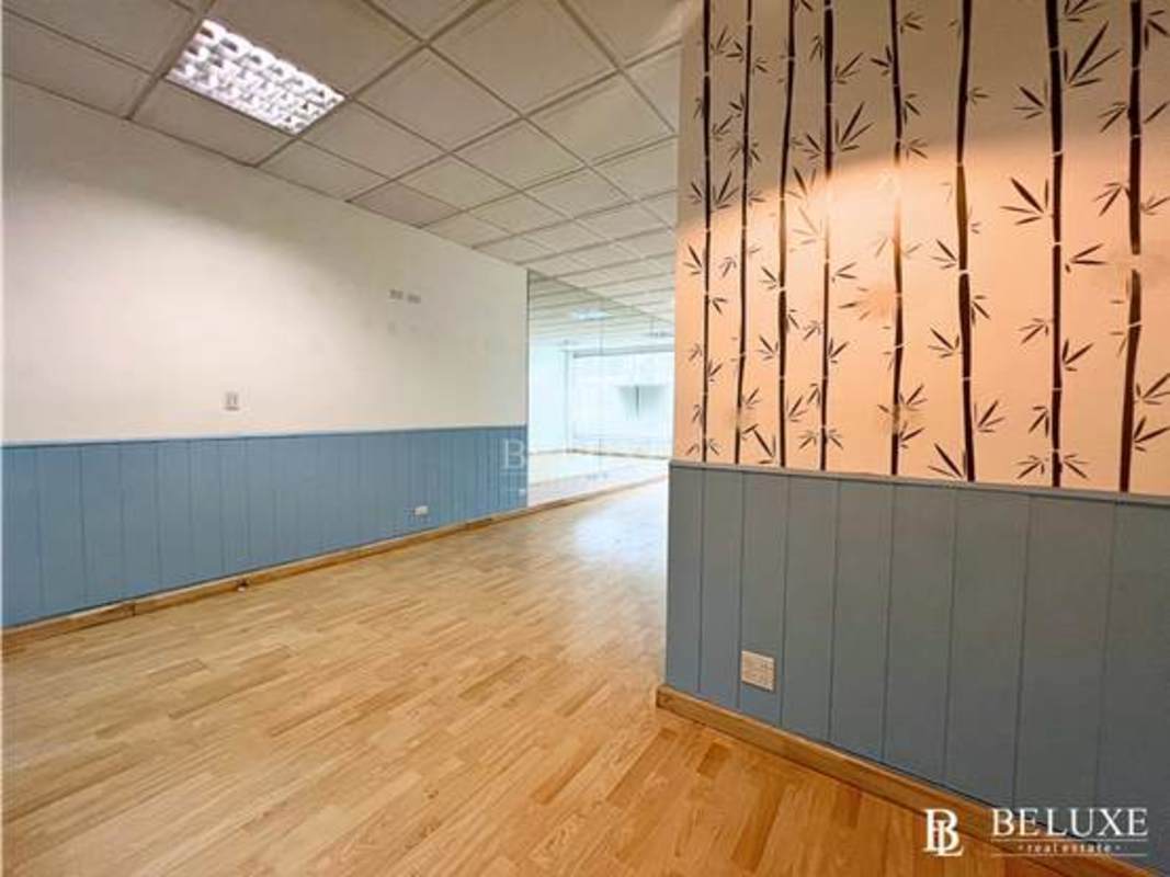 Modern office with bamboo wall pattern and wooden floors Panama City