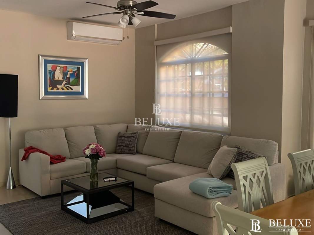 Spacious open-plan living and dining room with tile floors in Clayton home Panama City