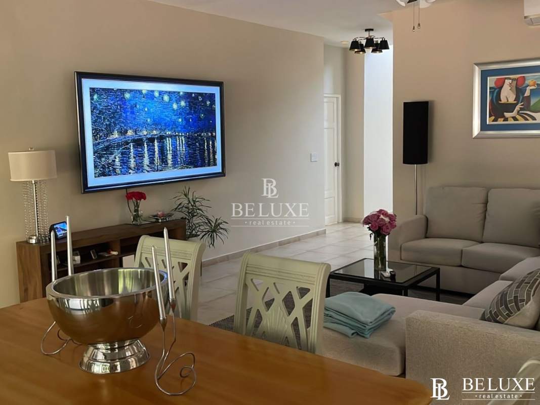 Spacious master bedroom with garden views and ensuite in Clayton Village house for rent