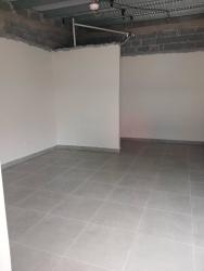 Industrial look unfinished interior with tiled floor exposed ceiling Costa Verde La Chorrera