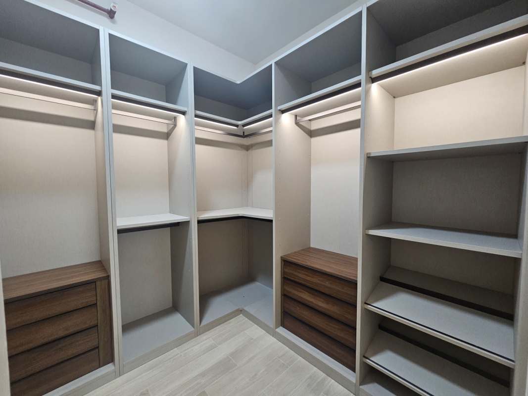 Modern luxury bathroom with glass-enclosed shower and top finishes at PH Waterfront Ocean Reef Islands Panama