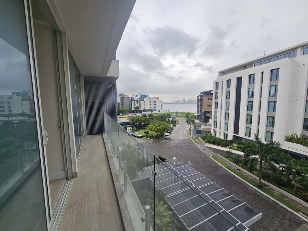 Spacious minimalist kitchen with large island and sea views at PH Waterfront, Ocean Reef Islands Panama