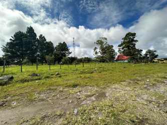 Large grassy land with fencing near cloud forest in Volcán, Panama