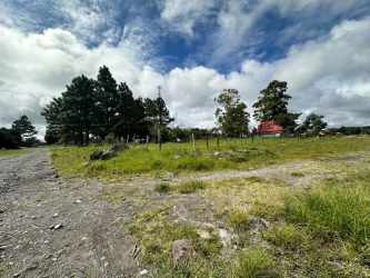Titled grassy land with panoramic mountain views in Chiriquí highlands Panama