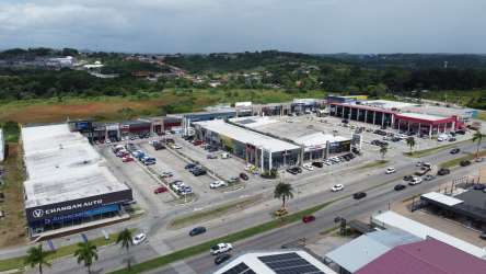 Aerial view of Uniplaza Costa Verde shopping plaza in Panama Oeste with parking and shops