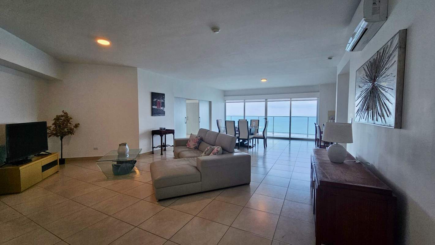 Open living dining area with panoramic ocean view and stylish furnishings Punta Pacifica