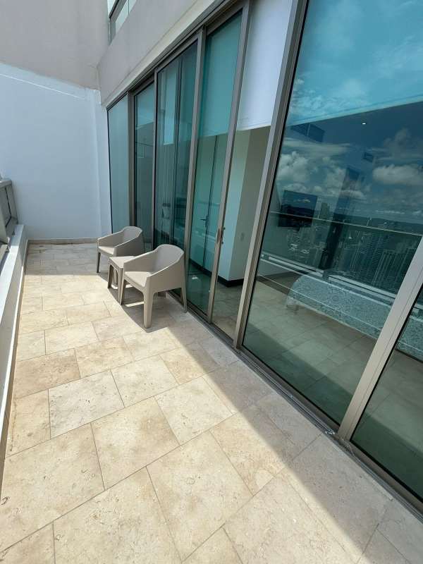 Kitchen with gray cabinets, marble flooring, stainless appliances in PH TOC Punta Pacífica