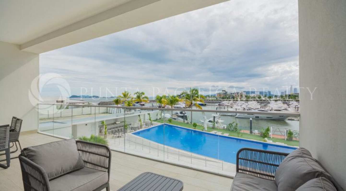Luxury master bedroom with balcony access and ocean views at Ocean Reef Islands Beach Club Residences Panama