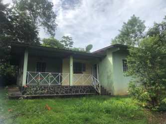 Entryway and living room with tiled floors and natural light in country house Altos de Capira Panama