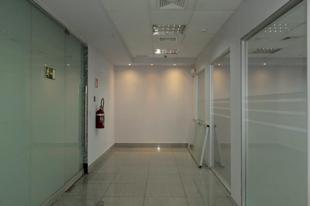 Wide empty open-plan office floor with glass walls at PH BICSA Tower Panama City