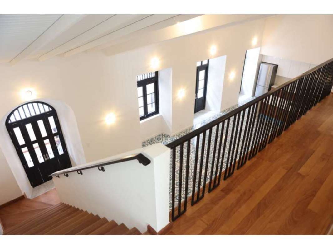 Townhouse staircase black rail patterned flooring colonial details Casco Viejo Panama