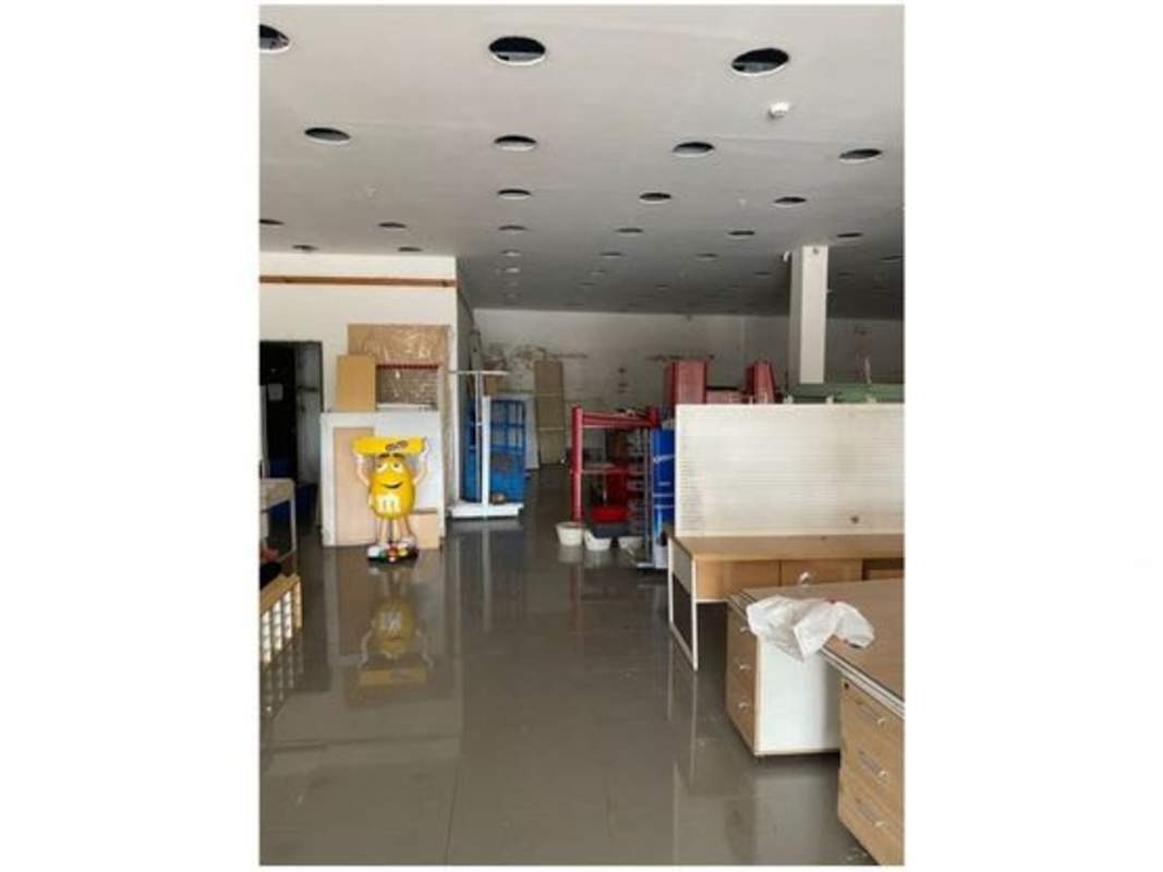 Open plan interior retail or warehouse space with tiled floor Plaza Nuevo Tocumen Panama