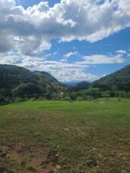 Lush green Penonomé countryside land with valley and mountain views Panama