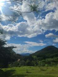 Aerial shot large rural land for sale El Coco Penonomé mountain views