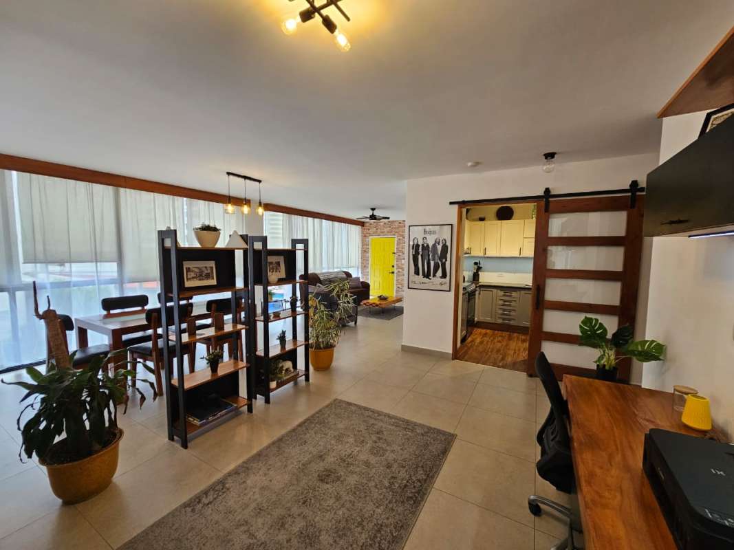 Large bedroom with city view window in PH Los Pilares San Francisco Panama