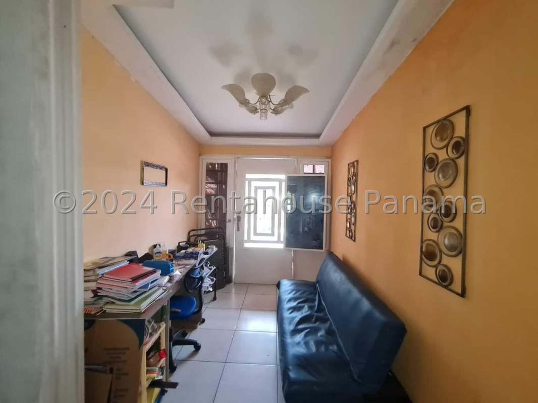 Winding staircase with metal railings, traditional decor inside villa zaita single family house for sale