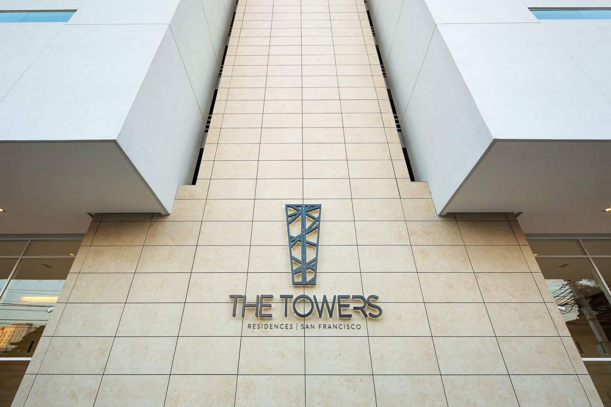 Open living and dining space with large windows and balcony access in PH The Towers San Francisco Panama