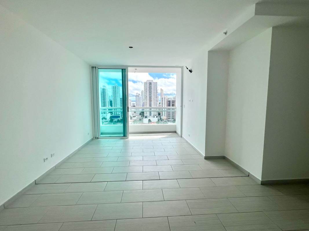 Modern walk-in closet with built-in shelves and drawers at PH The Towers San Francisco Panama