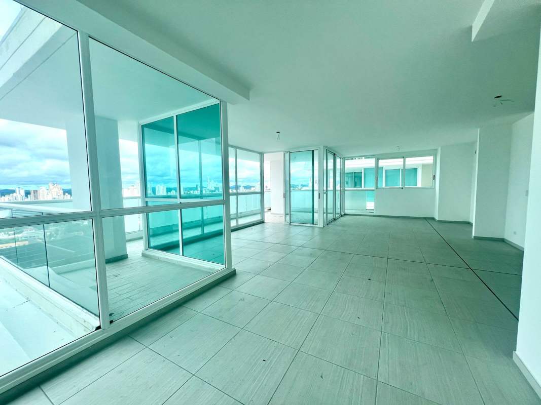 Modern kitchen with ample cabinetry and granite counters PH The Towers in San Francisco Panama City