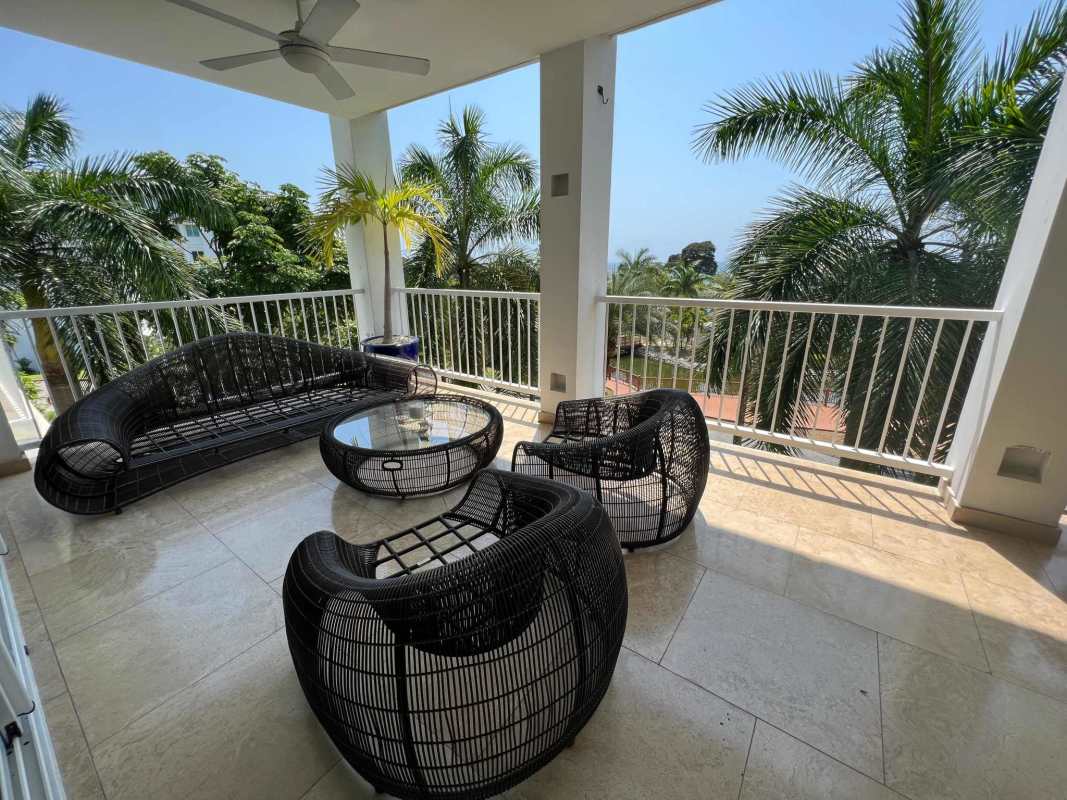 Fully equipped open marble kitchen with island, modern appliances in Bijao Beachfront Condo Panama