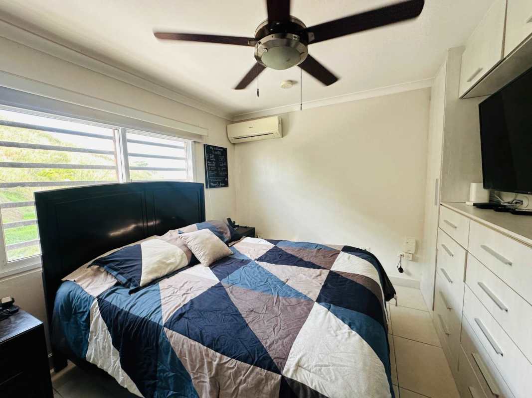 Large covered terrace with panoramic city views and seating Condado del Rey Panama house