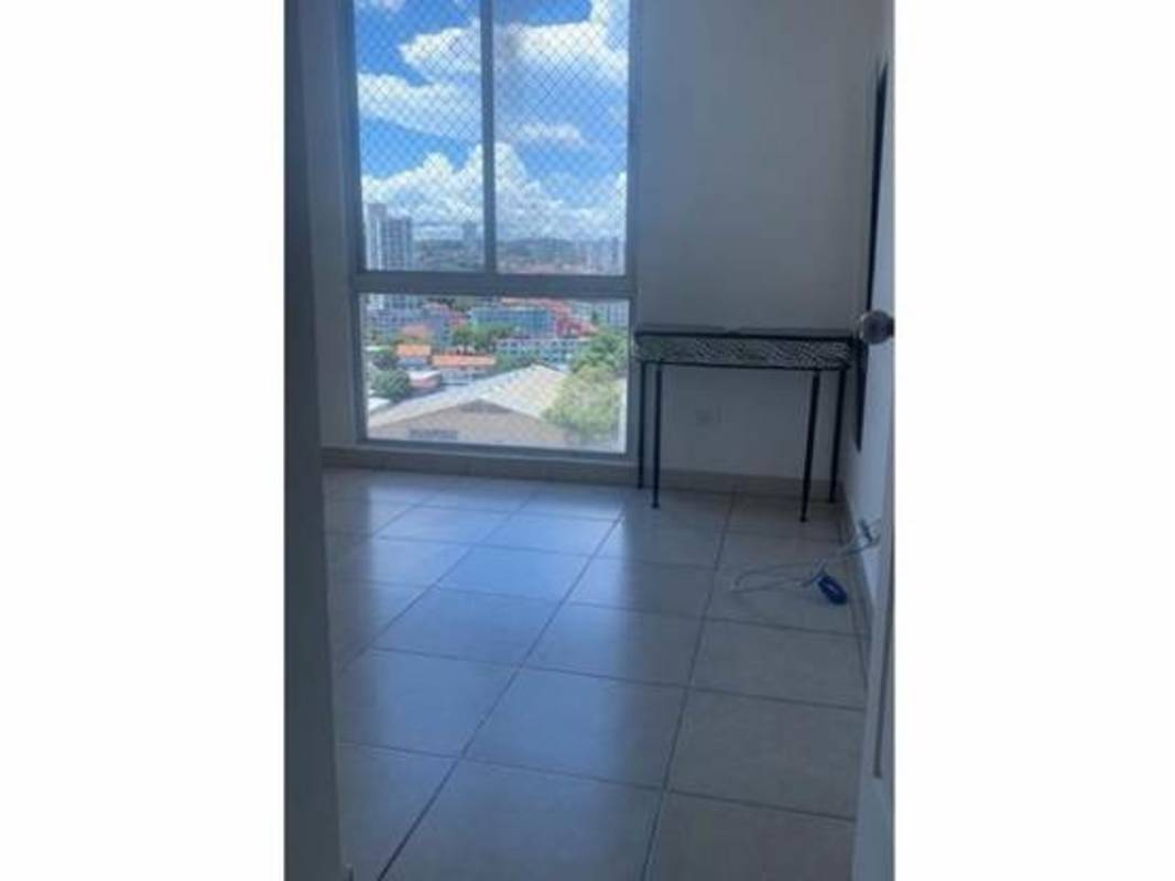 Bedroom with large window and skyline view in PH Splendor Carrasquilla Panama City
